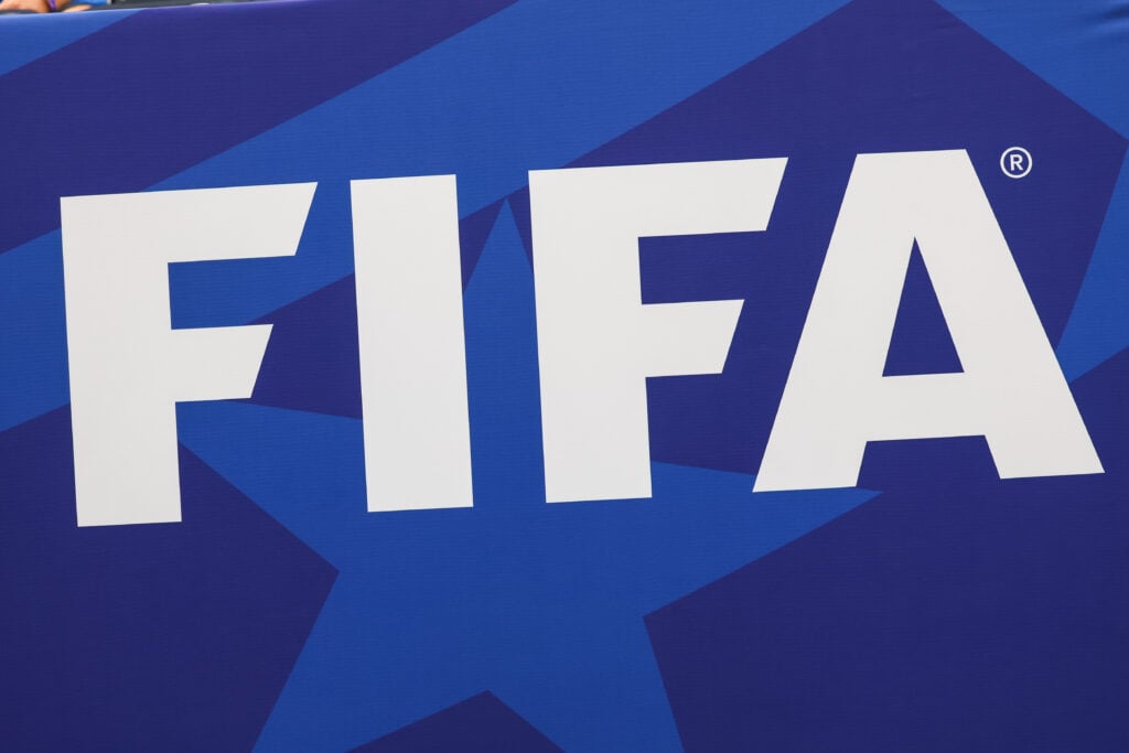 The FIFA logo is displayed pitch side ahead of the FIFA World Cup 2026 Group E match between Germany and Curaçao on June 14, 2026, at Houston Stadium.