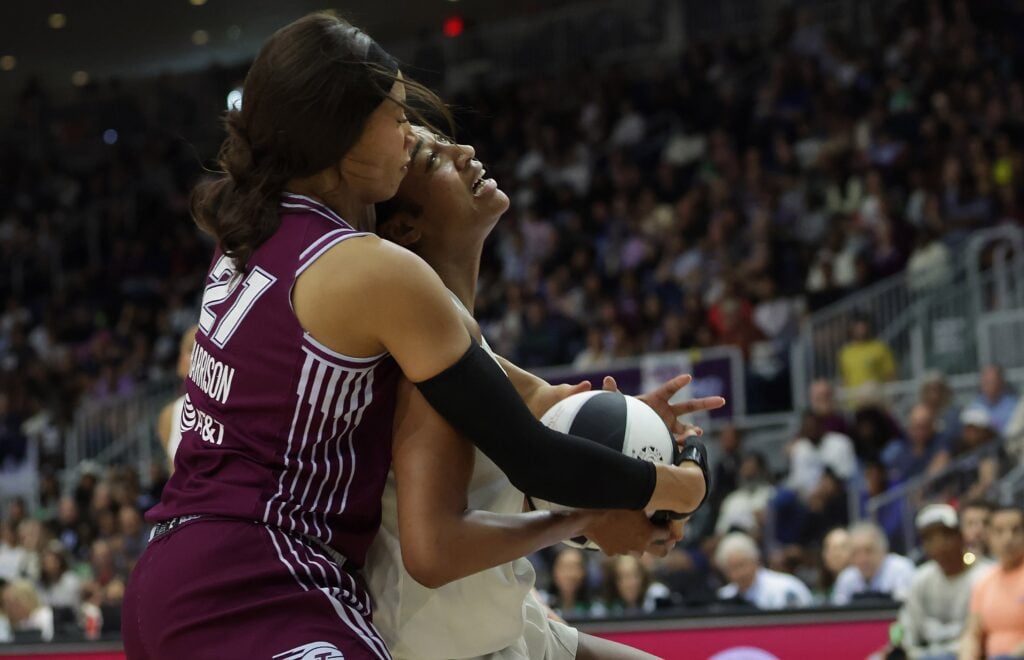 Isabelle Harrison #21 of the Toronto Tempo would earn a flagrant two for a foul on Angel Reese #5 of the Atlanta Dream as the Toronto Tempo play the Atlanta Dream at Coca-Cola Coliseum.