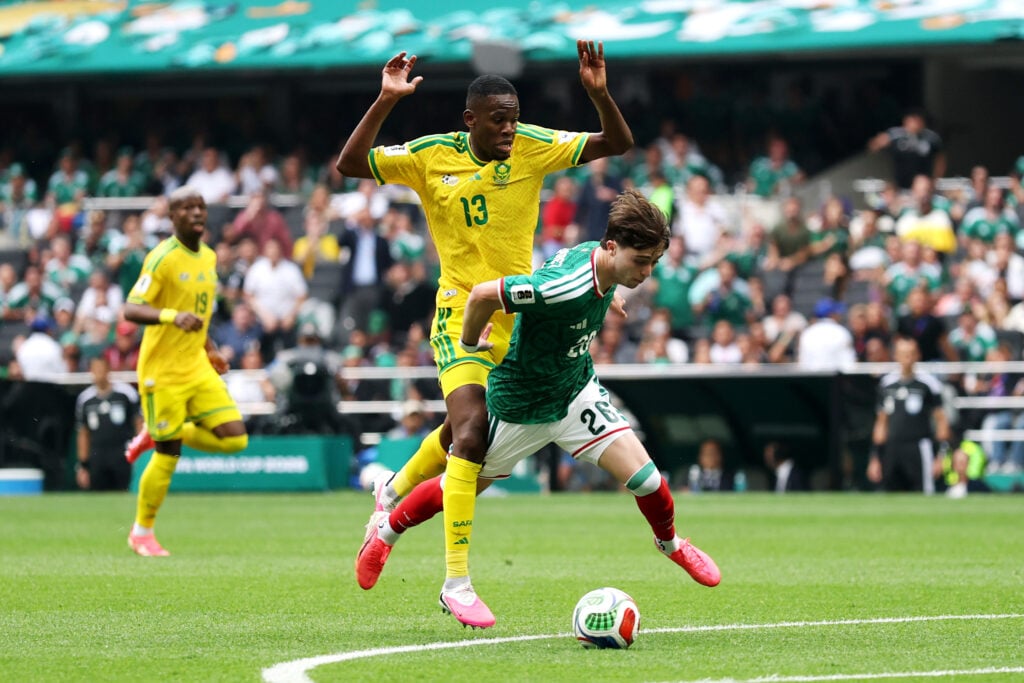 Brian Gutierrez #26 of Mexico is fouled by Sphephelo Sithole #13 of South Africa during the FIFA World Cup 2026 Group A match between Mexico and South Africa at Mexico City Stadium on June 11, 2026 in Mexico City, Mexico. Sithole was issued a red card