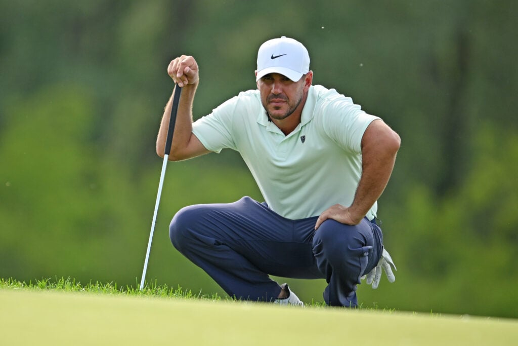 Brooks Koepka reads a putt on the 17th hole during the first round of the Canadian Open