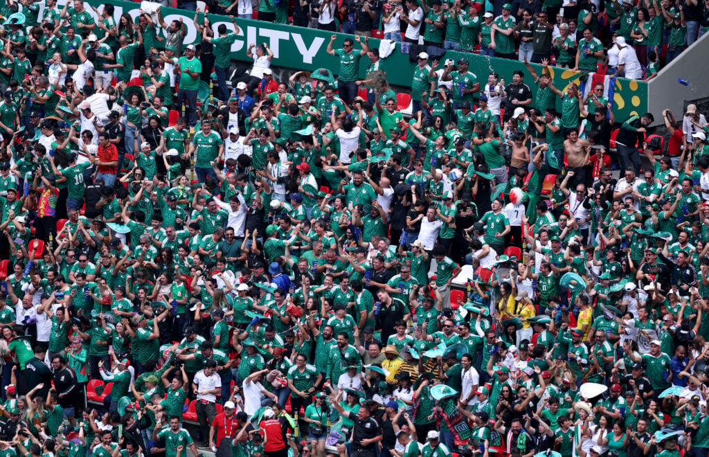 Mexican fans celebrate a goal during the FIFA World Cup 2026 Group A match between Mexico and South Africa.