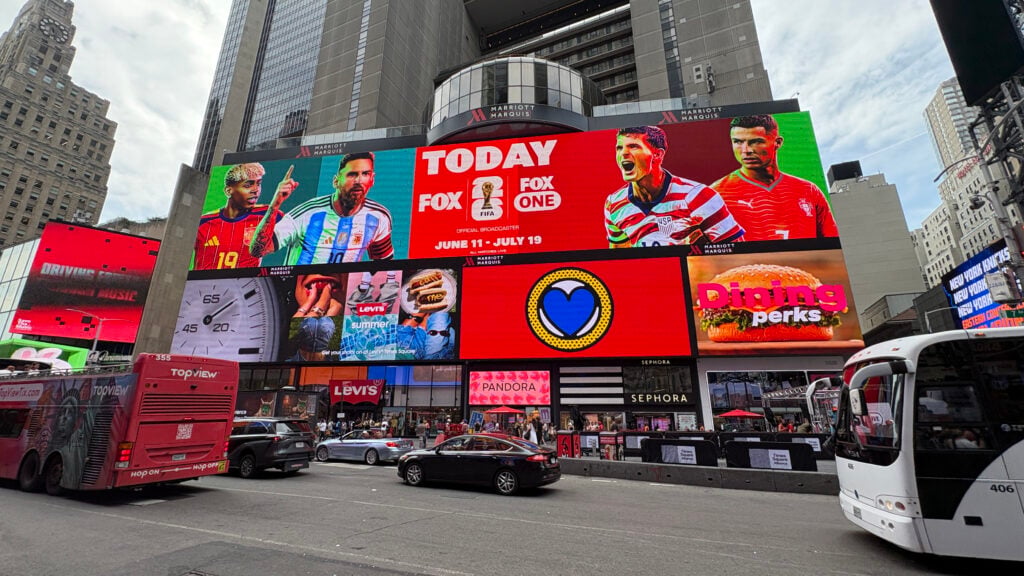 FIFA World Cup 2026 FOX Sports branding in Times Square featuring Lamine Yamal, Lionel Messi, Christian Pulisic and Cristiano Ronaldo on June 11, 2026 in New York, New York.