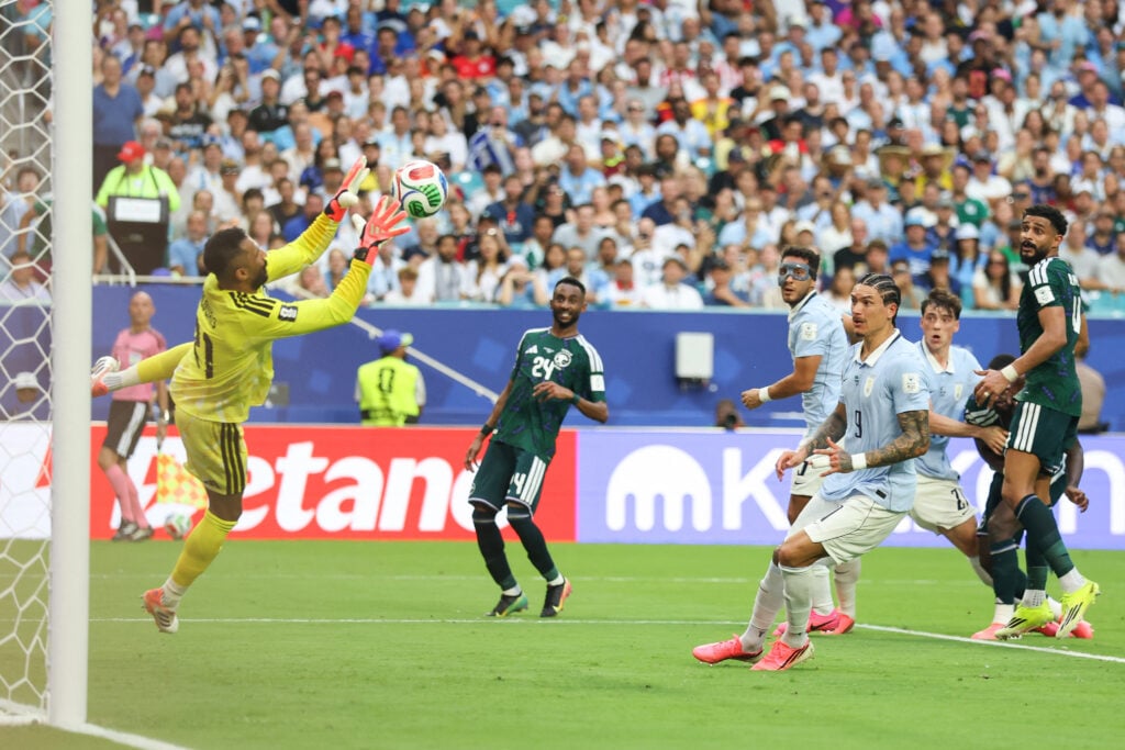 Saudi Arabia's goalkeeper #21 Mohammed Al-Owais catches the ball during the 2026 World Cup Group H football match between Saudi Arabia and Uruguay at the Miami Stadium in Miami Gardens on June 15, 2026.