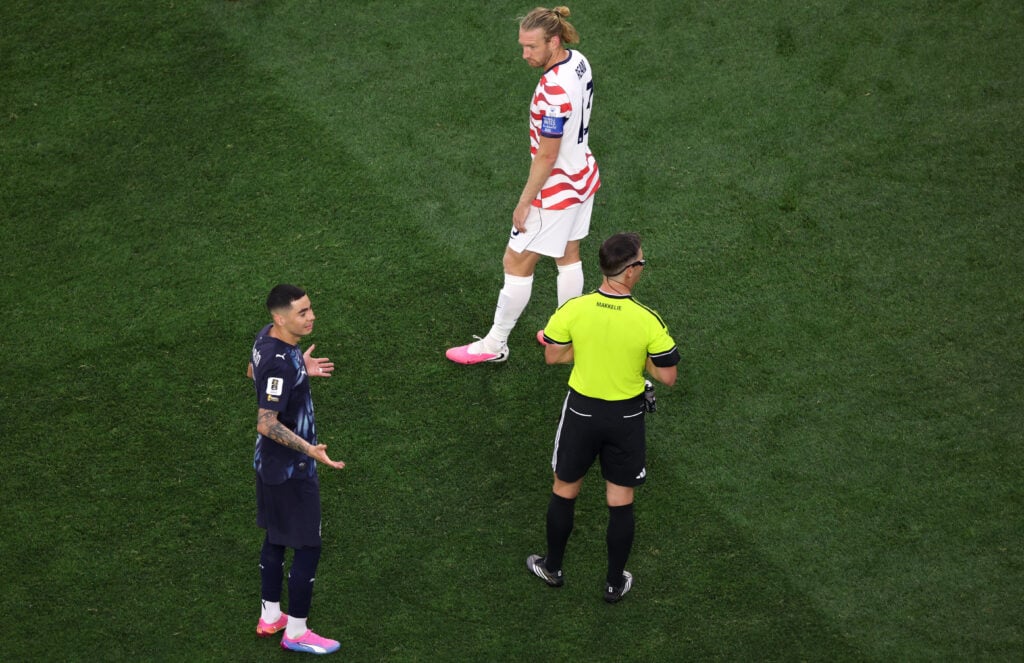 Miguel Almiron and Tim Ream during a 2026 FIFA World Cup clash between the United States and Paraguay