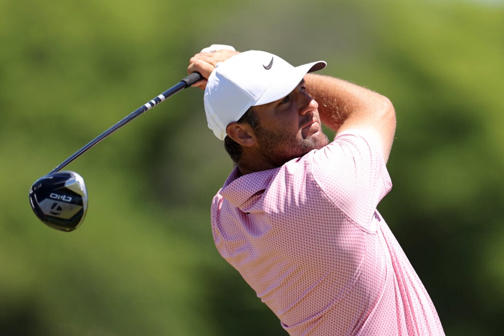 Scottie Scheffler of the United States plays his shot from the eighth tee during a practice round prior to the 126th U.S. OPEN at Shinnecock Hills Golf Club