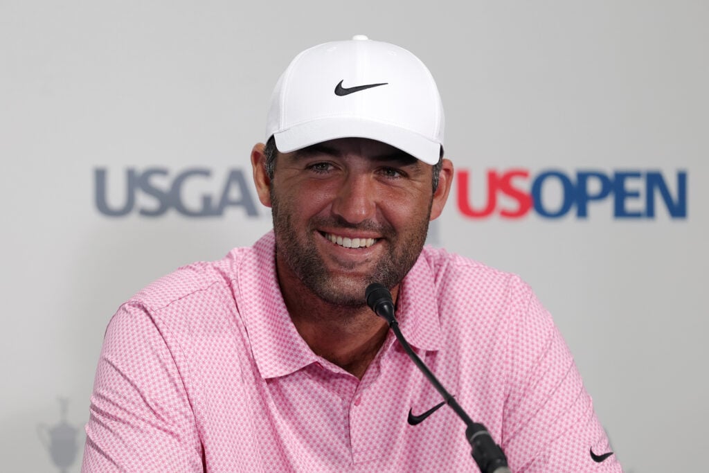 Scottie Scheffler of the United States speaks to the media after a practice round prior to the 126th U.S. OPEN at Shinnecock Hills Golf Club