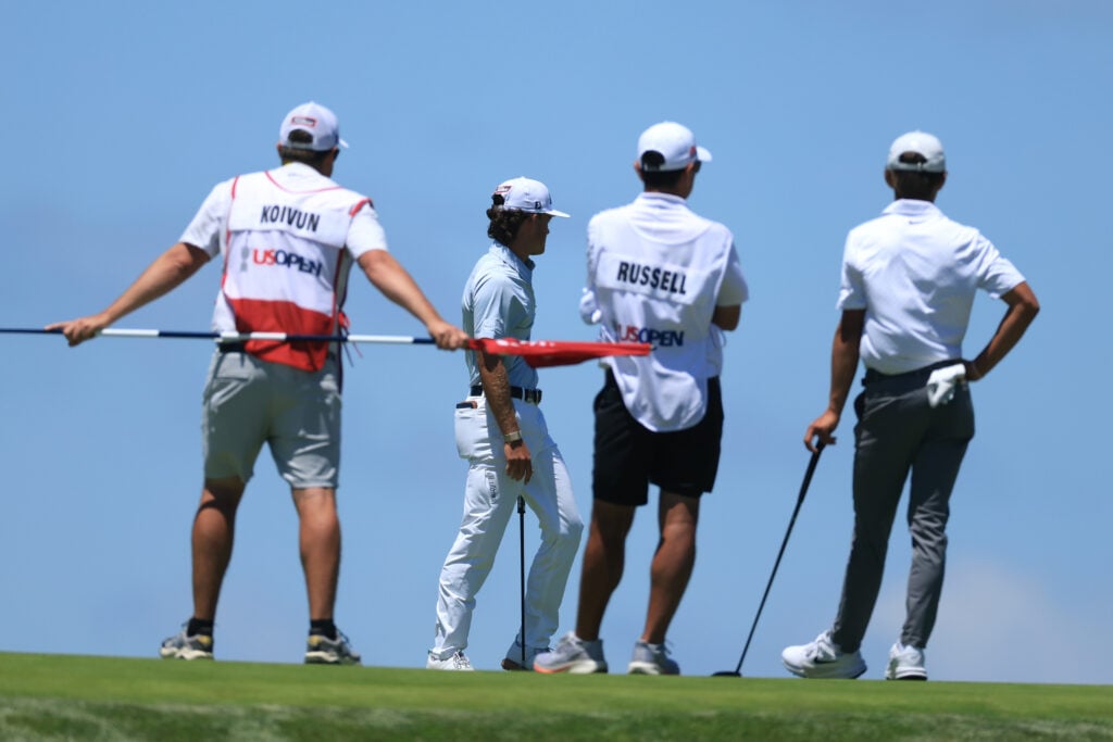 Amateur Miles Russell watches Amateur Jackson Koivun putt during the third round of the 126th U.S. OPEN at Shinnecock Hills