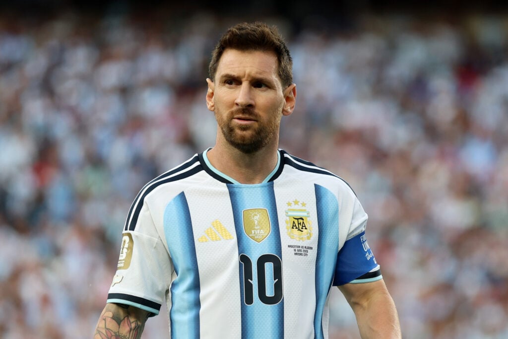 Lionel Messi #10 of Argentina looks on, as the The World Cup Legacy Patch is seen on his match shirt sleeve, during the FIFA World Cup 2026 Group J match between Argentina and Algeria at Kansas City Stadium on June 16, 2026 in Kansas City, Missouri.