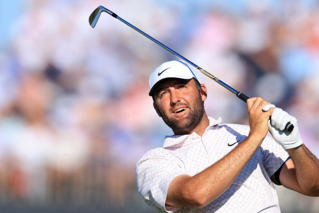 Scottie Scheffler tees off on the 17th hole during the third round of the US Open