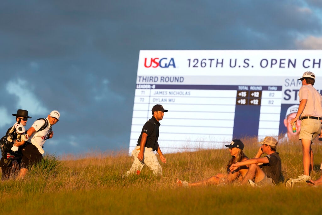 Xander Schauffele walks to scoring during the third round of 126th U.S. Open Championship at Shinnecock Hills Golf Club