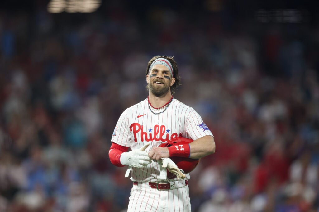 Bryce Harper #3 of the Philadelphia Phillies celebrates on third base after hitting for his first career cycle with a two-run triple in the fifth inning during the game between the New York Mets and the Philadelphia Phillies at Citizens Bank Park on Saturday, June 20, 2026 in Philadelphia, Pennsylvania.
