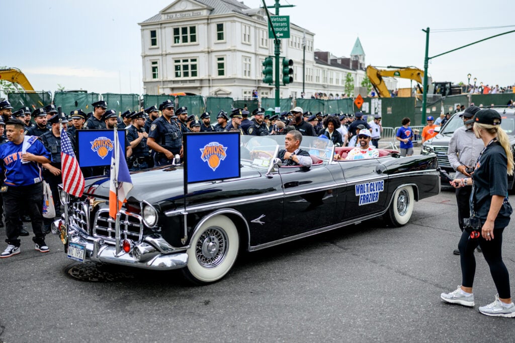 Walt "Clyde" Frazier celebrates during the New York Knicks Championship ticker tape parade and victory rally celebrating winning the 2026 NBA Finals.