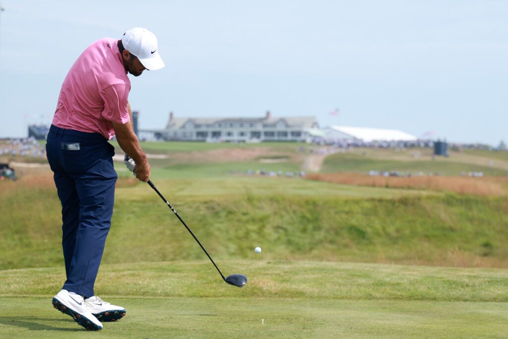 Scottie Scheffler of the United States plays a shot from the 18th tee during the first round of the 126th U.S. OPEN at Shinnecock Hills Golf Club