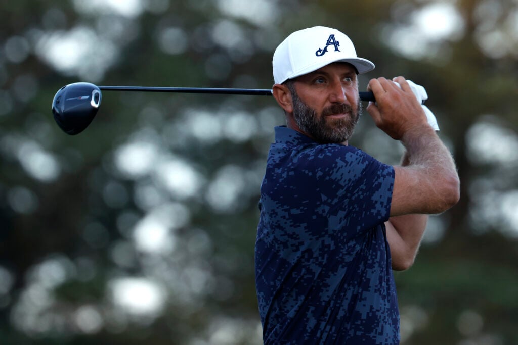 Dustin Johnson tees off during the first round of the US Open