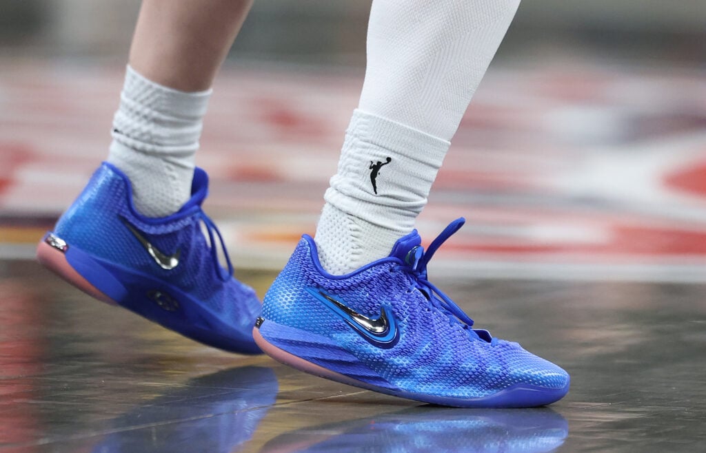 The shoes of Caitlin Clark #22 of the Indiana Fever against the Atlanta Dream at Gainbridge Fieldhouse.