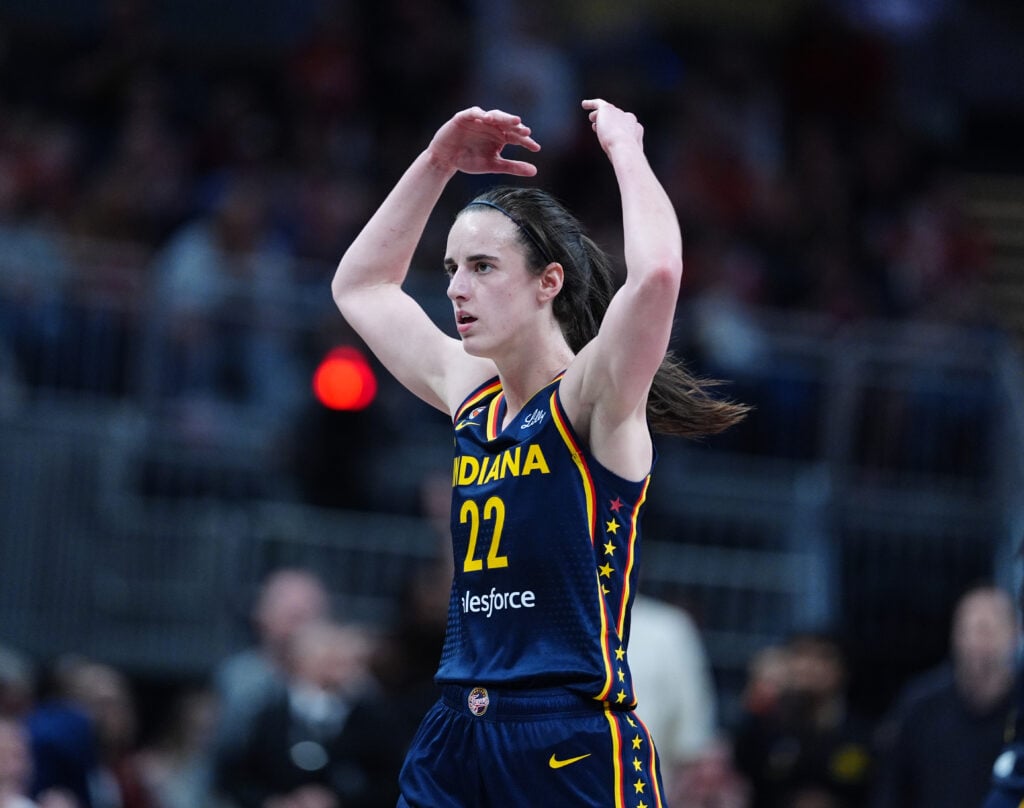 Indiana Fever guard Caitlin Clark (22) motions for the crowd to make some noise during a game against the Phoenix Mercury on June 22, 2026, at Gainbridge Fieldhouse in Indianapolis, Indiana.