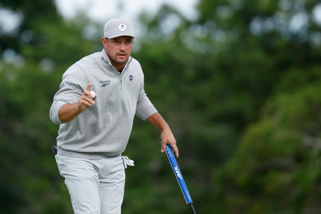 Bryson DeChambeau of the United States acknowledges the crowd after making par on the second green during the second round of the 126th U.S. OPEN at Shinnecock Hills Golf Club