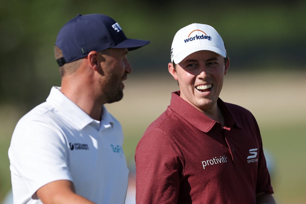 Wyndham Clark and Matt Fitzpatrick speak during the third round of the US Open