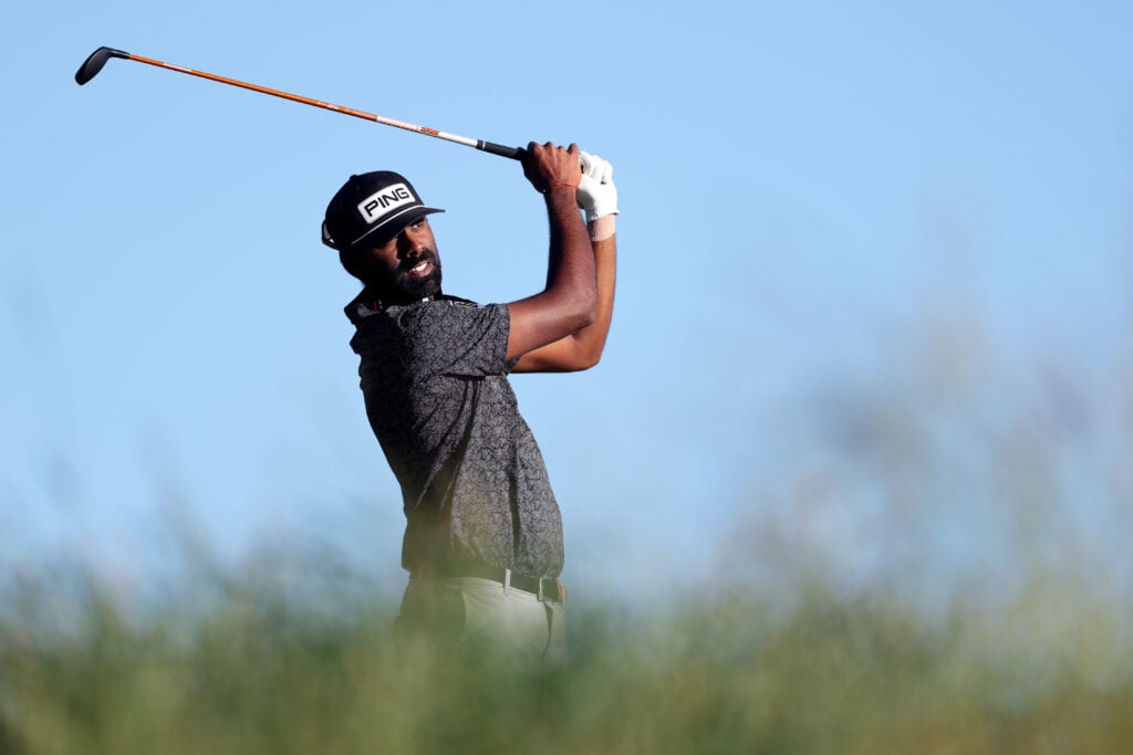 Sahith Theegala hits a tee shot during the third round of the US Open