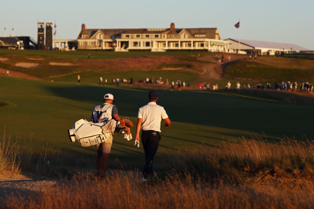 Wyndham Clark walks down the 18th hole during the third round of the US Open