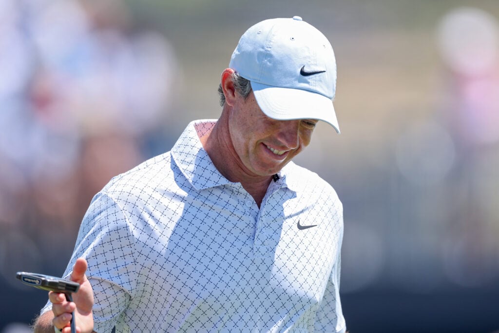 Rory McIlroy of Northern Ireland looks on from the second green during the final round of the 126th U.S. OPEN at Shinnecock Hills Golf Club