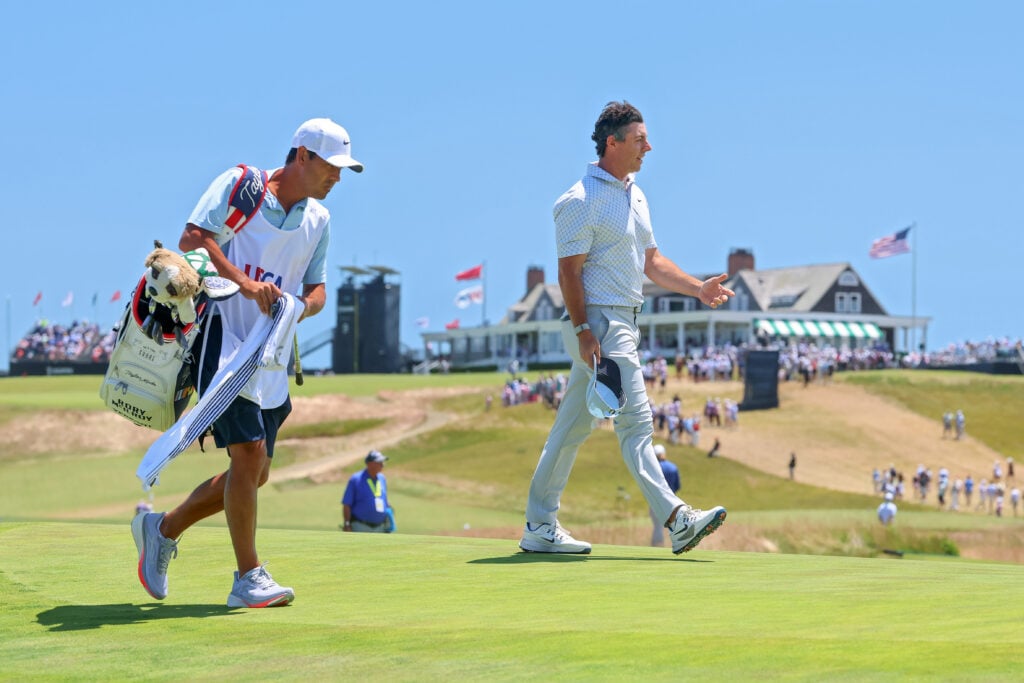 Rory McIlroy walks to the first green with caddie Harry Diamond during the final round of the 126th U.S. OPEN at Shinnecock Hills Golf Club