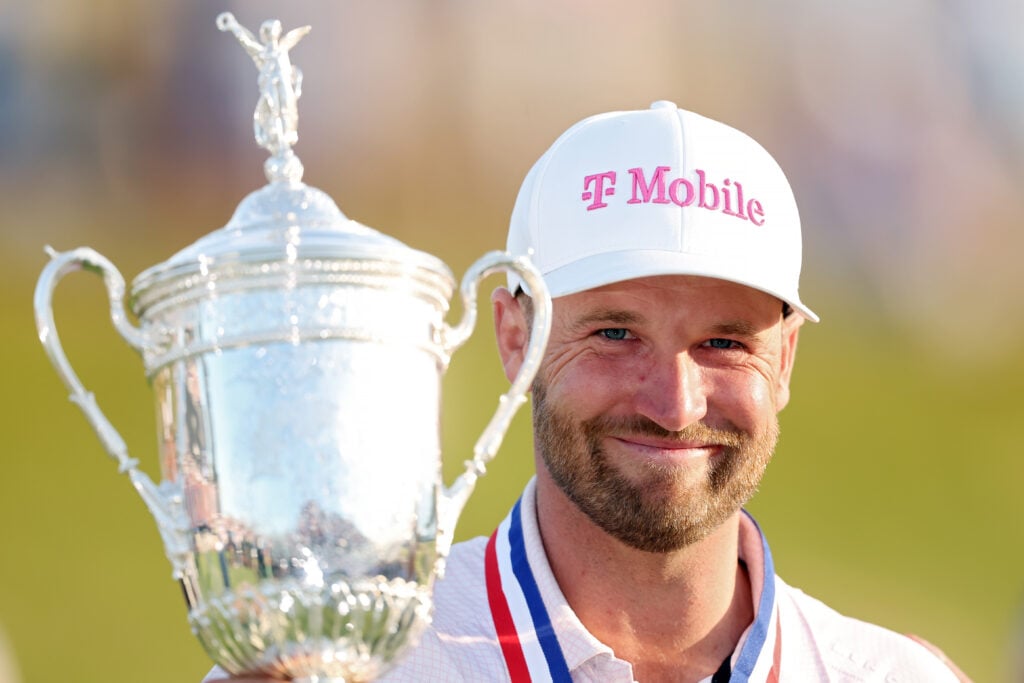Wyndham Clark poses with the U.S. Open Championship Trophy after winning the OPEN at Shinnecock Hills