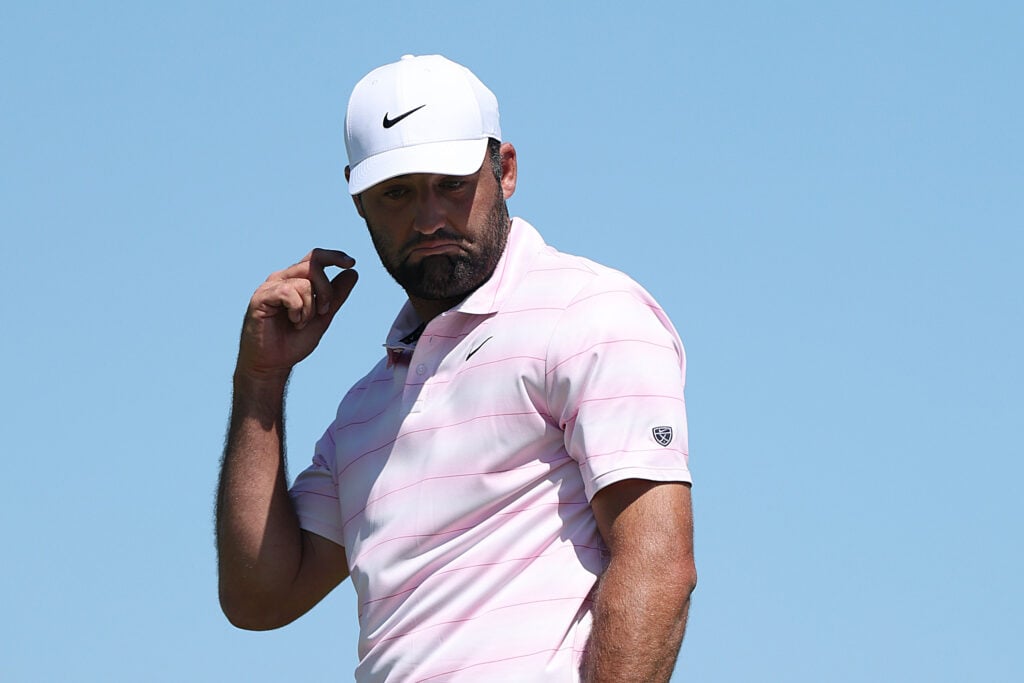 Scottie Scheffler reacts to a putt during the final round of the US Open