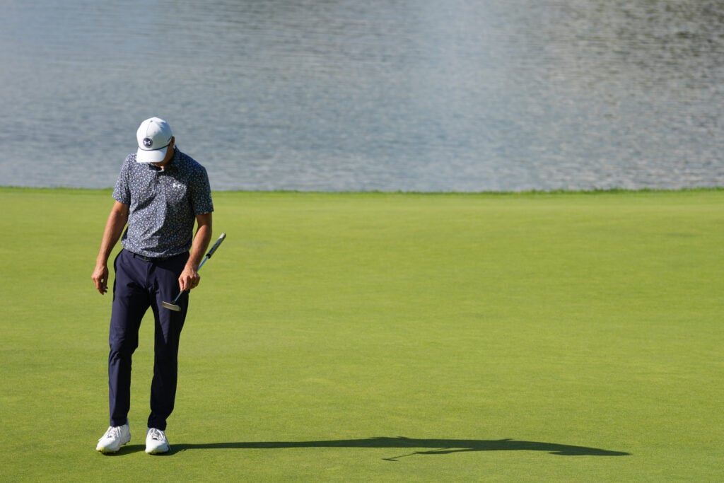 Jordan Spieth walks off the 16th green during the first round of the Travelers Championship at TPC River Highlands