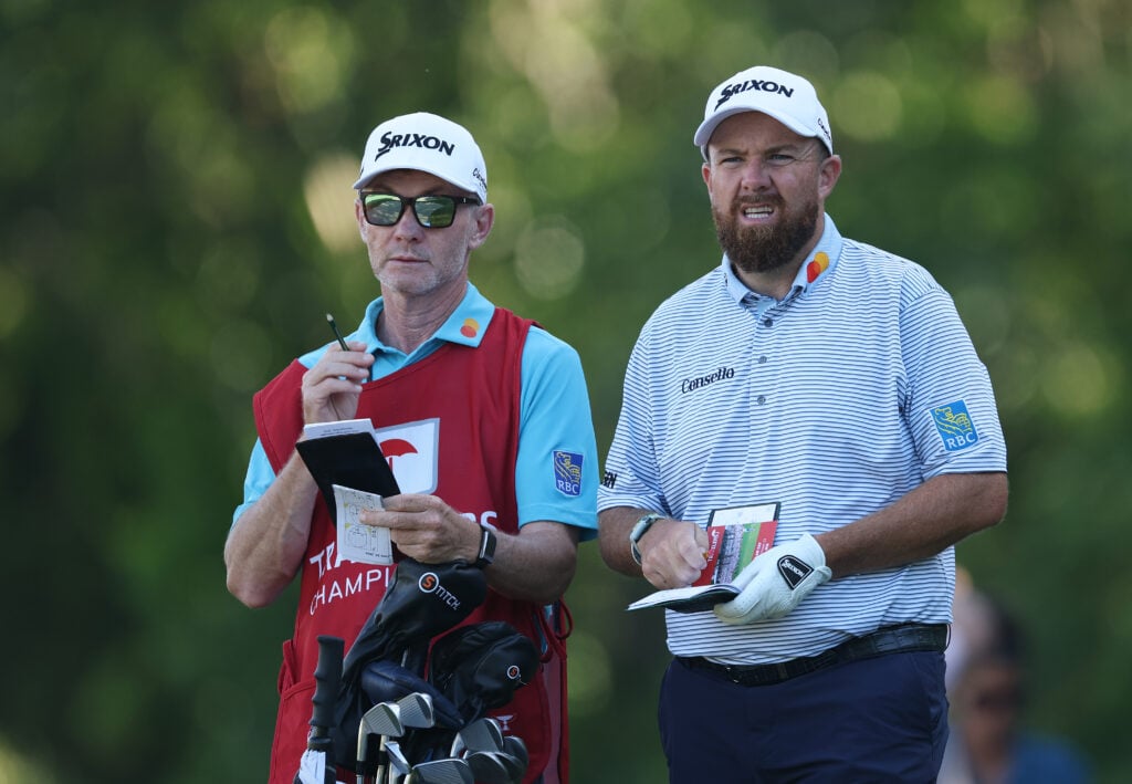 Shane Lowry and his caddie during a practice round at TPC River Highlands ahead of the Travelers Championship