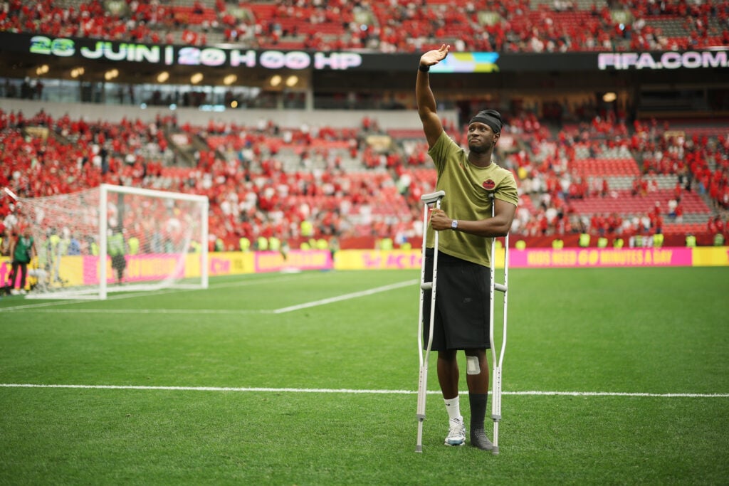 Injured Ismael Kone #8 of Canada applauds fans after the team's 1-2 defeat in the FIFA World Cup 2026 Group B match between Switzerland and Canada.