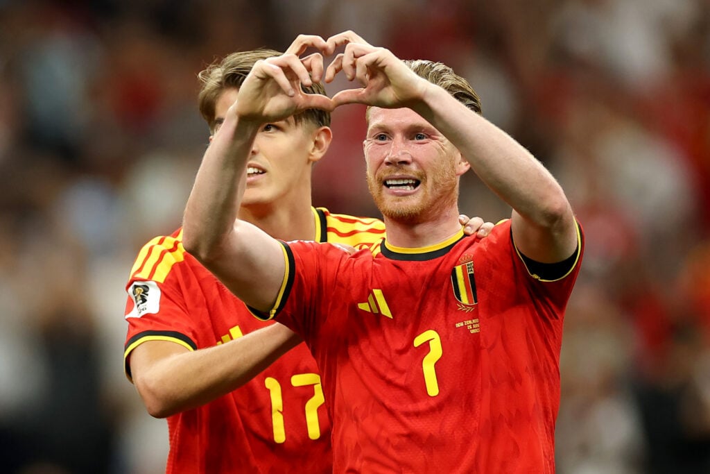 Kevin De Bruyne #7 of Belgium celebrates with teammate Charles De Ketelaere #17 after scoring his team's third goal during the FIFA World Cup 2026.