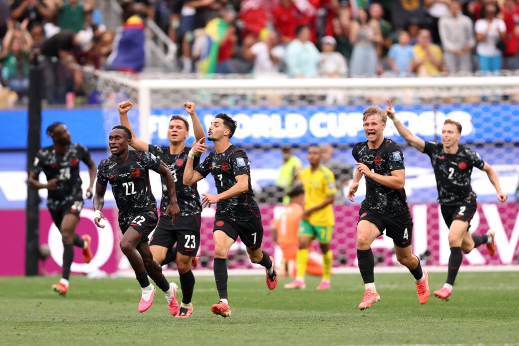 Stephen Eustaquio #7 of Canada celebrates scoring his team's first goal with team mates during the FIFA World Cup 2026 Round Of 32 match between South Africa and Canada.