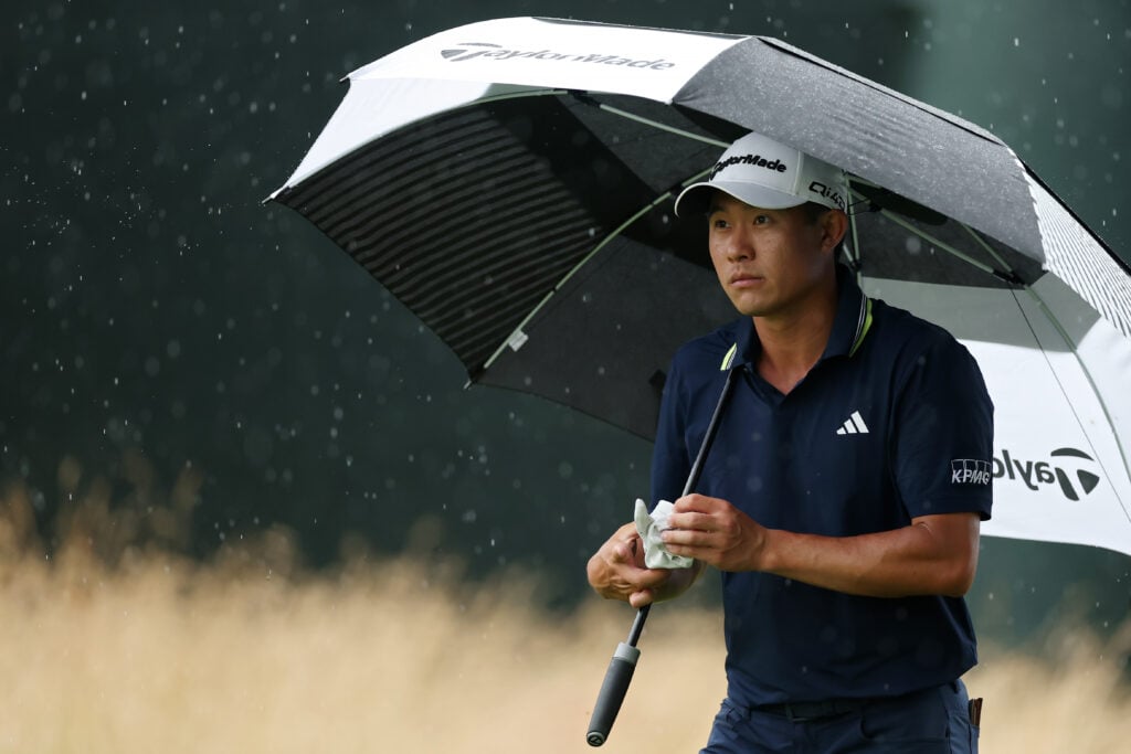 Collin Morikawa walks up the final hole during the last round of the Travelers Championship