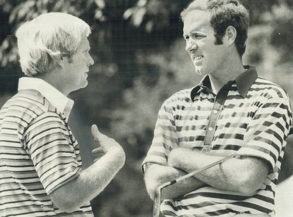 Out: Jack Ncklaus (left) chats with Tom Weiskopf; the defending champion; during a break in play at the Canadian Open