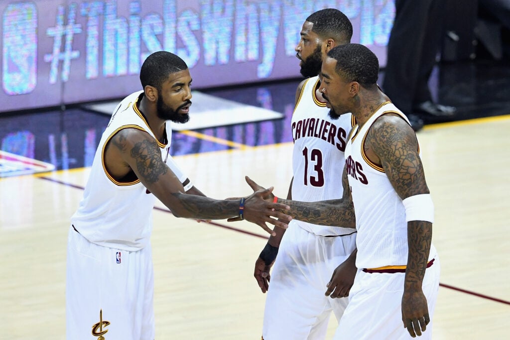Kyrie Irving #2, Tristan Thompson #13 and JR Smith #5 of the Cleveland Cavaliers react after a play in the first quarter against the Golden State Warriors in Game 4 of the 2017 NBA Finals at Quicken Loans Arena on June 9, 2017 in Cleveland, Ohio.