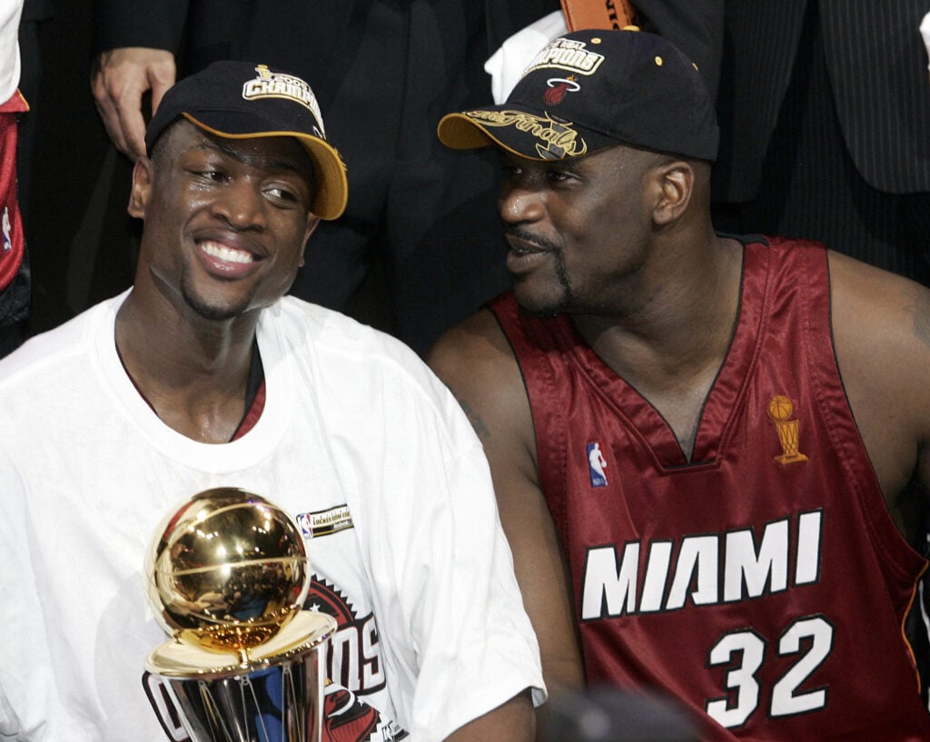 Dwyane Wade (L) and Shaquille O'Neal (R)