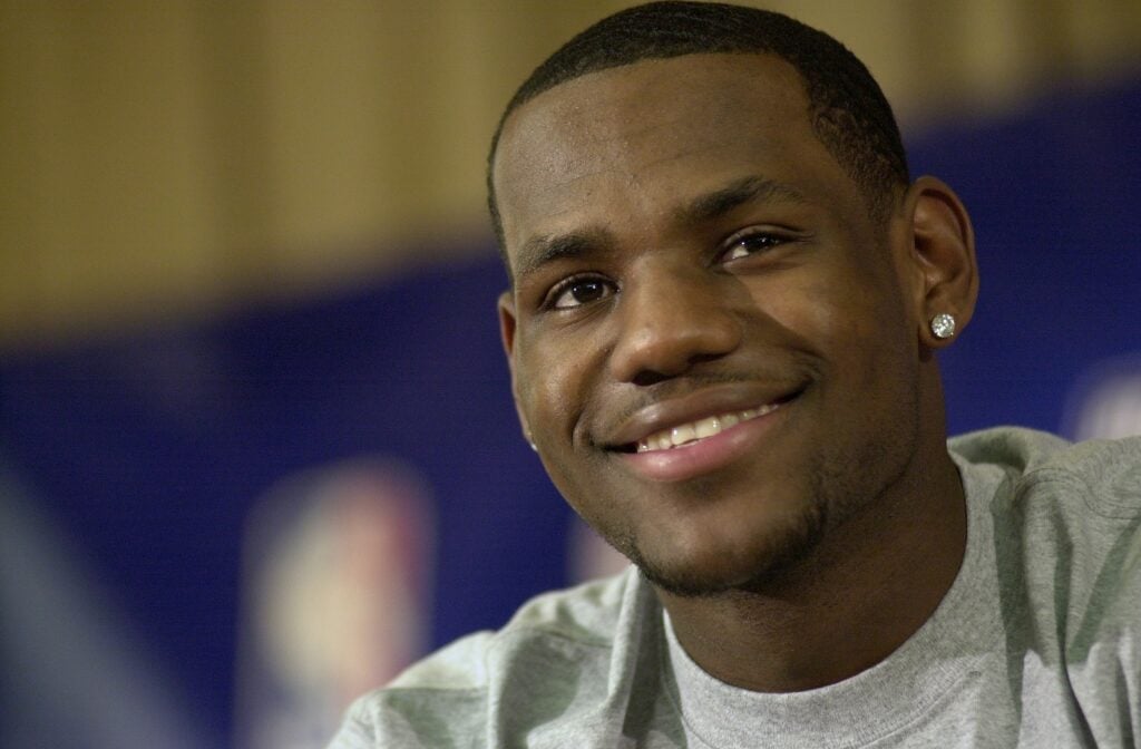 LeBron James, the Cleveland Cavaliers' rookie basketball player, is on hand to read to students at Public School 8 in Washington Heights.