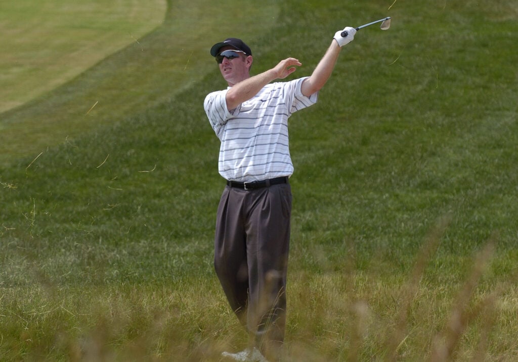 David Duval hits an approach shot during the first round of the 2004 US Open