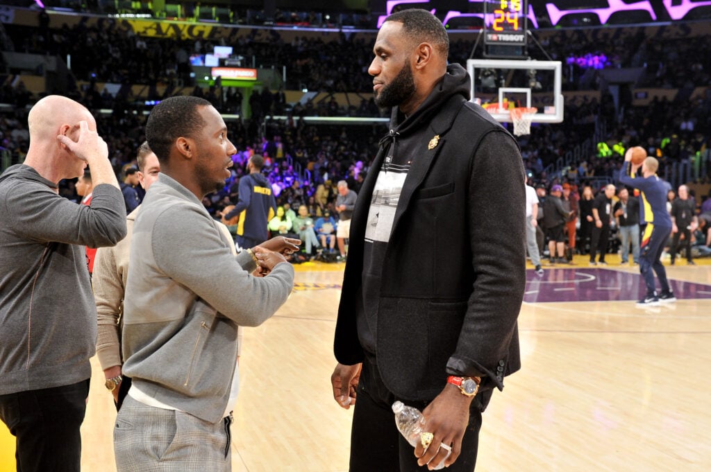 Rich Paul and LeBron James talk during halftime of a basketball game between the Los Angeles Lakers and the Denver Nuggets at Staples Center on December 22, 2019
