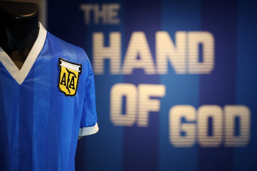 A football shirt worn by Argentina's Diego Maradona during the 1986 World Cup quarter-final match against England, is pictured during a photocall at Sotheby's auction house in London.