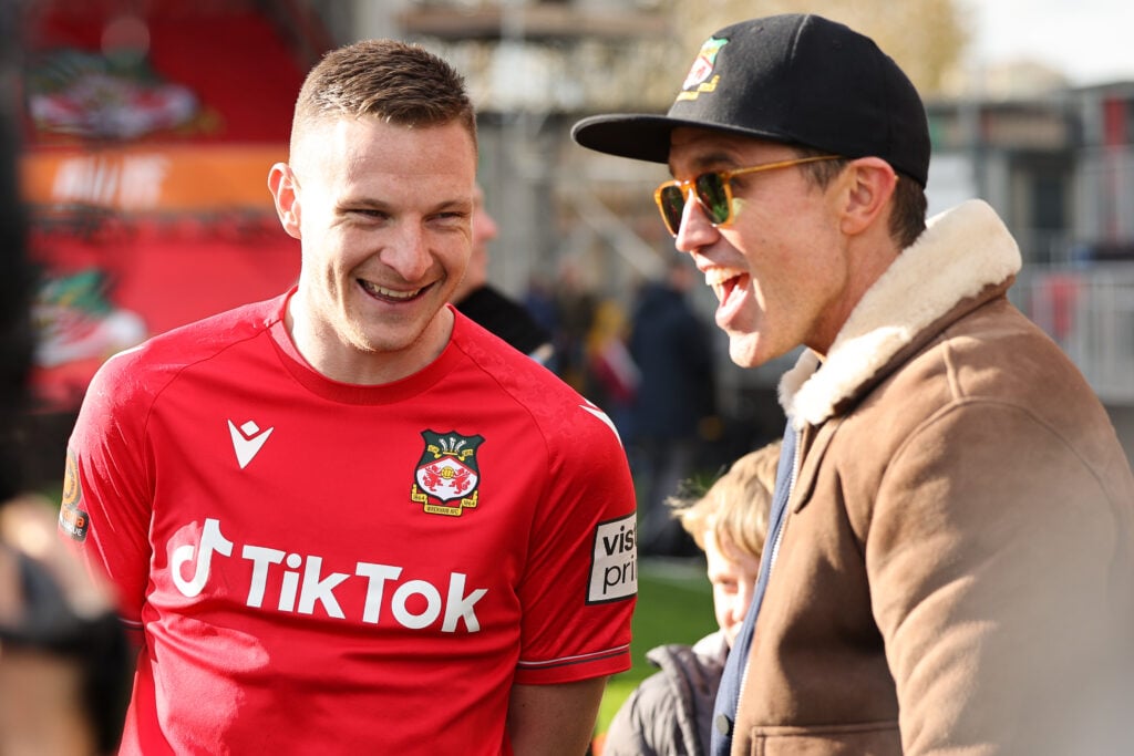 Paul Mullin of Wrexham chats to American actor and co-owner of Wrexham Football Club Rob McElhenney