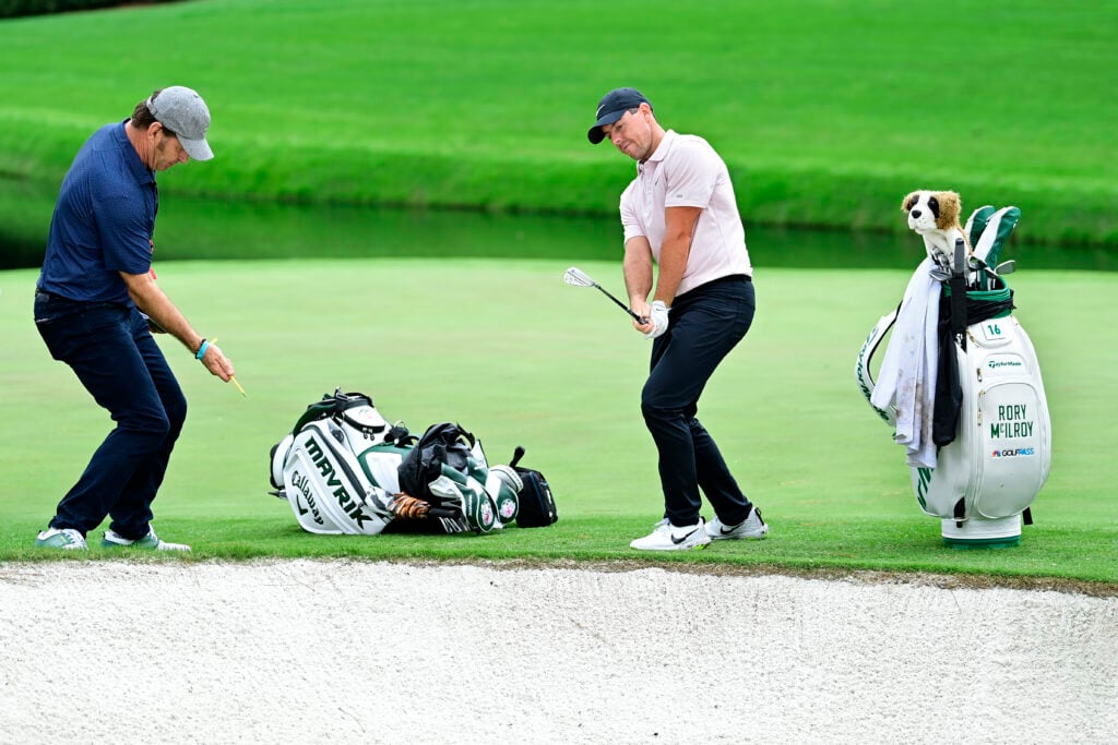 Nick Faldo with Rory McIlroy during Practice Round 3 for the Masters at Augusta National