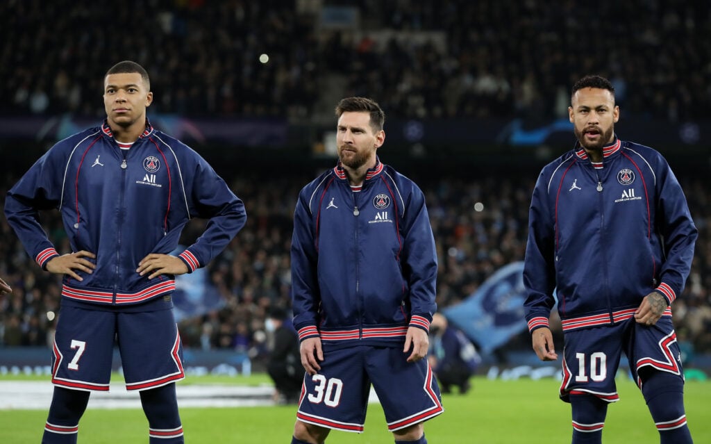 Kylian Mbappe, Lionel Messi and Neymar of Paris Saint-Germain line up prior to the UEFA Champions League group A match between Manchester City and Paris Saint-Germain at Etihad Stadium.