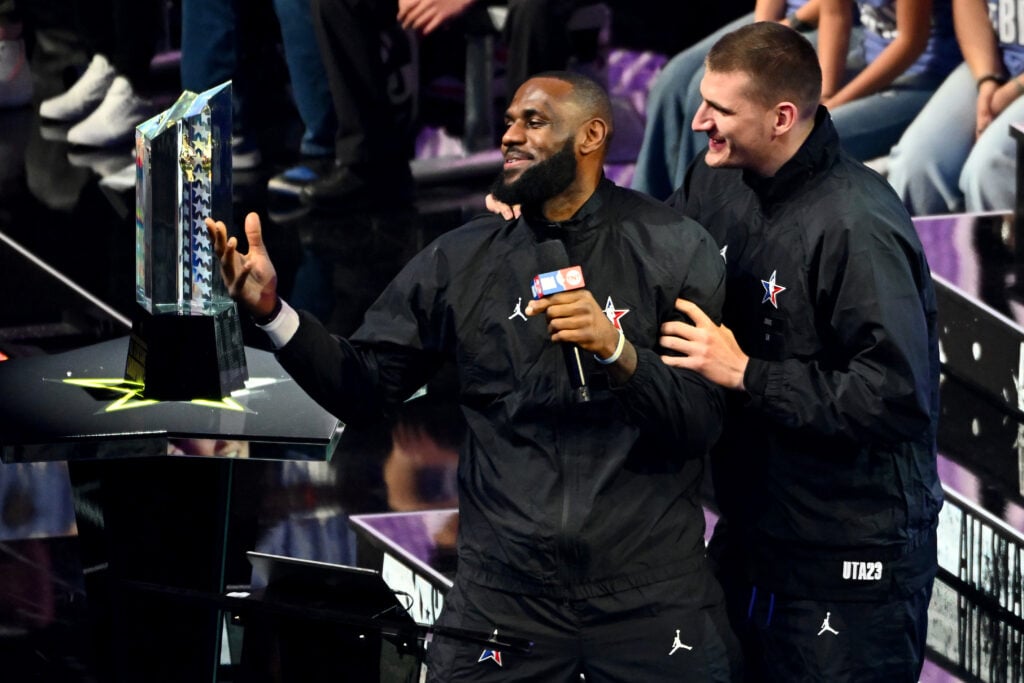 LeBron James of the Los Angeles Lakers and Nikola Jokic of the Denver Nuggets hug prior to the 2023 NBA All Star Game between Team Giannis and Team LeBron at Vivint Arena.