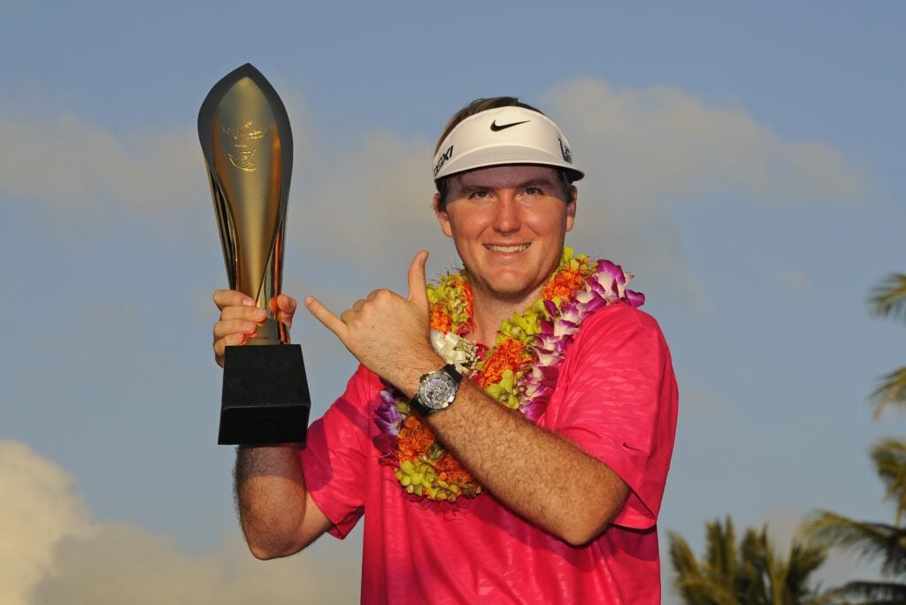 Russell Henley poses with the tournament trophy after winning the Sony Open in Hawaii at Waialae Country Club on January 13, 2013 in Honolulu, Hawaii