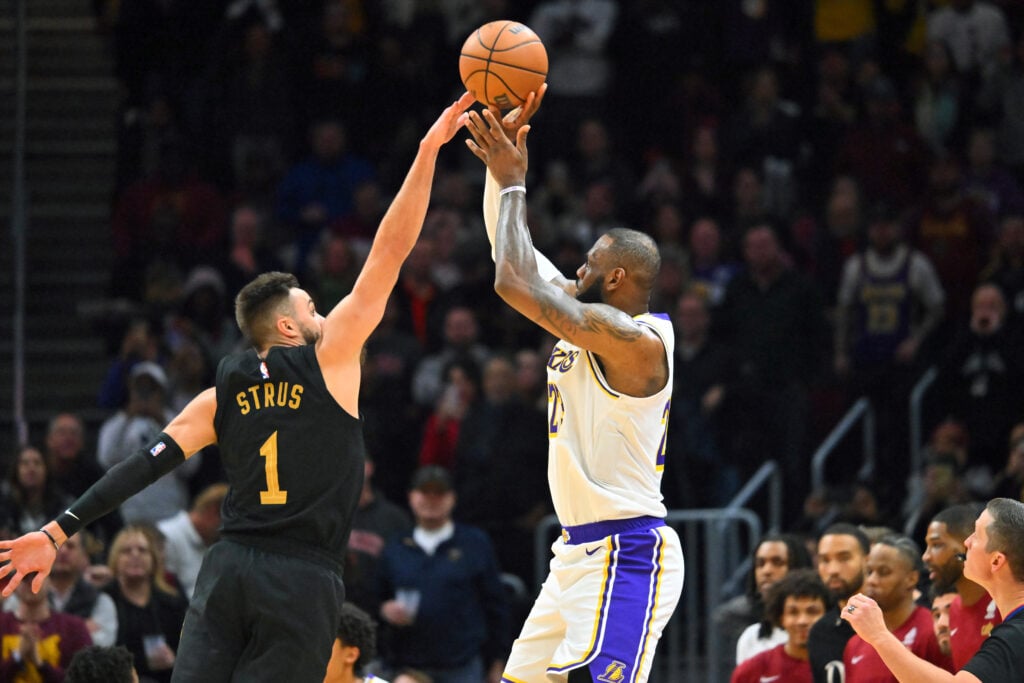 LeBron James #23 of the Los Angeles Lakers shoots over Max Strus #1 of the Cleveland Cavaliers during the fourth quarter at Rocket Mortgage Fieldhouse on November 25, 2023 in Cleveland, Ohio. The Lakers defeated the Cavaliers 121-115.