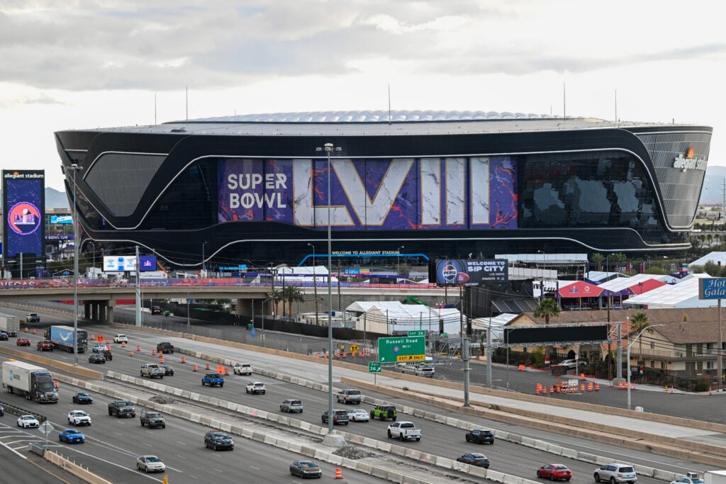 A video board displays logos for Super Bowl LVIII at Allegiant Stadium ahead of Super Bowl LVIII