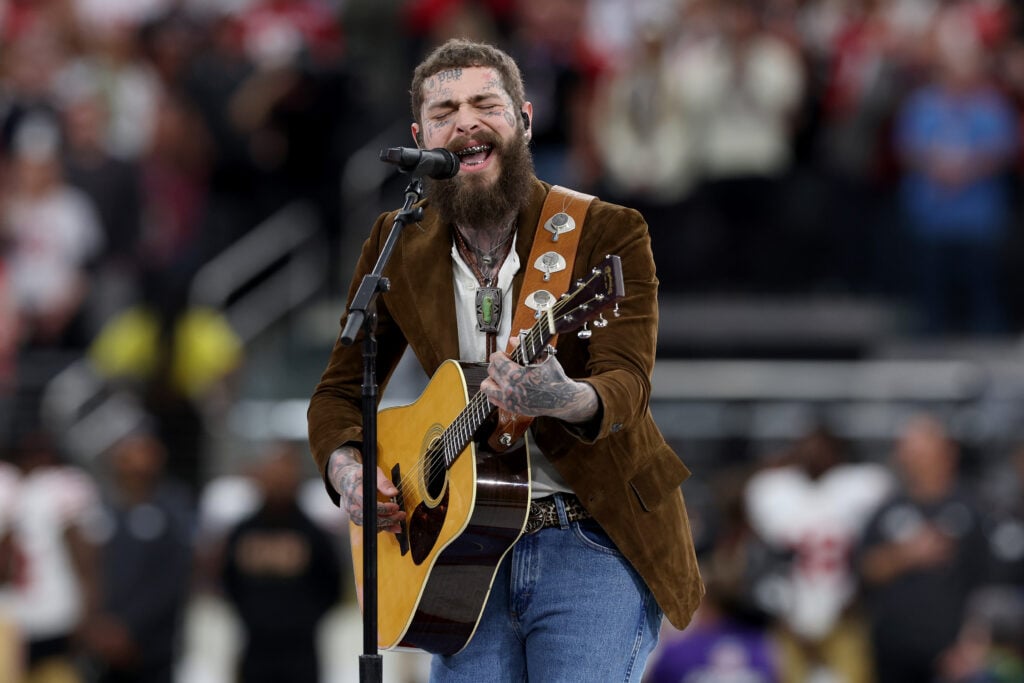 American rapper and singer Post Malone performs prior to Super Bowl LVIII between the San Francisco 49ers and Kansas City Chiefs at Allegiant Stadium.