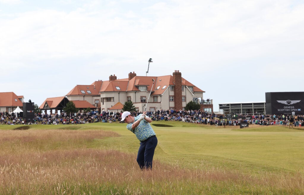 Robert MacIntyre of Scotland plays his second shot on the second hole during day four of the Genesis Scottish Open at The Renaissance Club